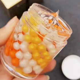 کرم مروارید دور چشم GOLD زرد فوق آبرسان SADOER